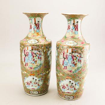 A pair of Chinese kanton vases later part of the 19th century porcelain.