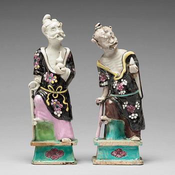 848. A pair of famille rose figures of 'Immortals', Qing dynasty, late 18th Century.