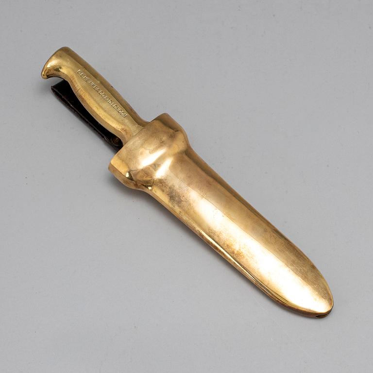 A brass diver's knife from C.E. Heinke & Co. Ltd., London, England.