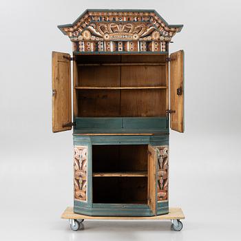 A Dalecarlian polychrome painted cabinet, dated 1798.
