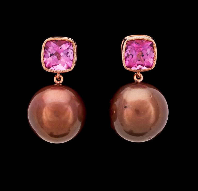 A pair of cultured brown South sea pearl, 15 mm, and pink tourmaline earrings.