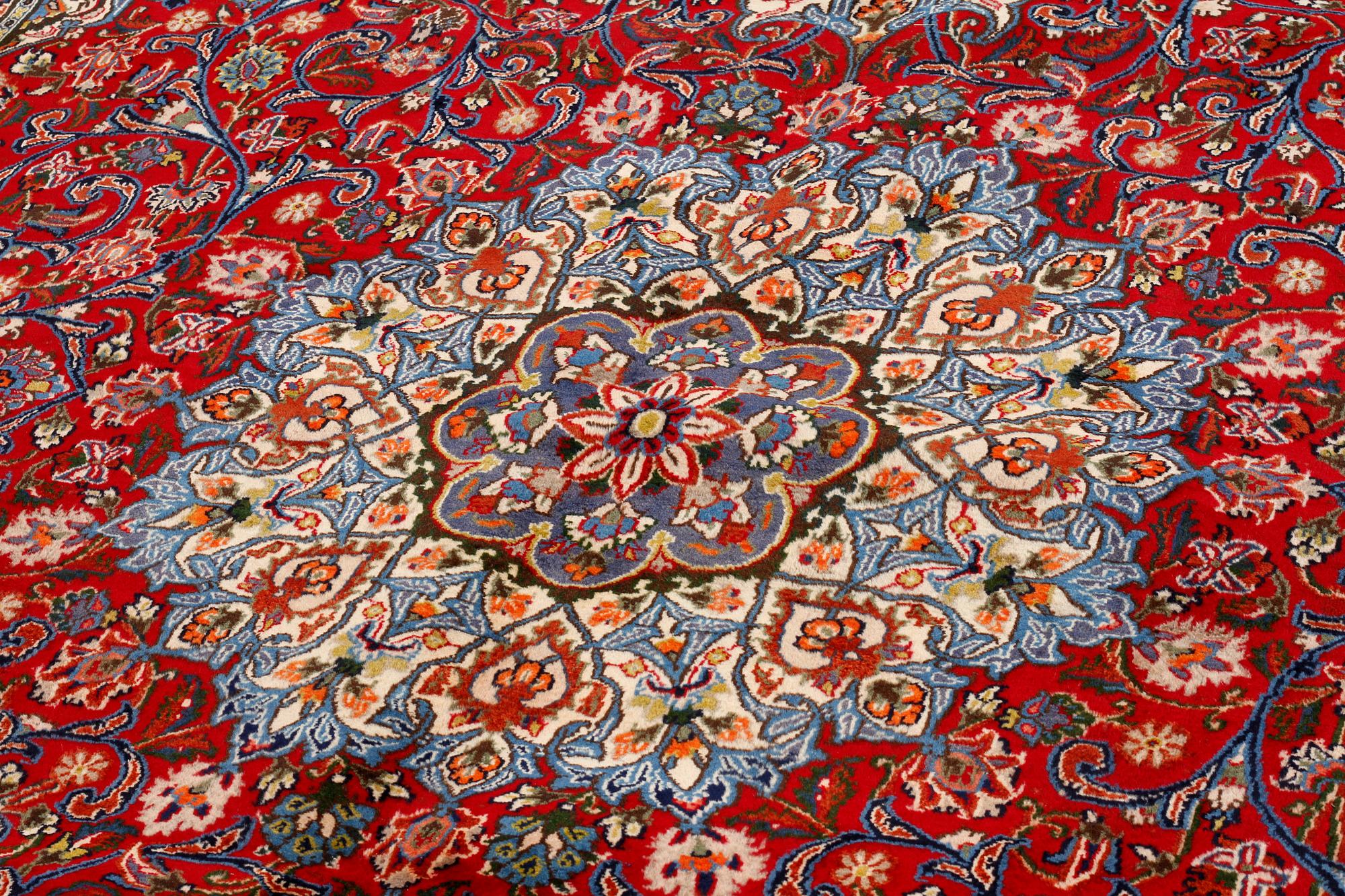 A Semnan rug, signed, 388 x285 cm.