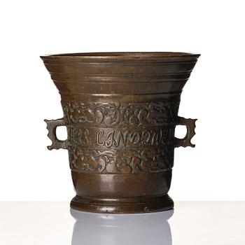 A Swedish late baroque bronze mortar and pestle, dated 1759.