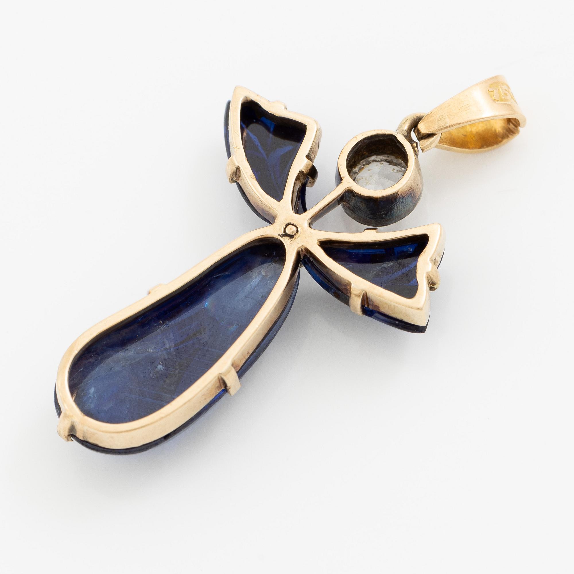 Pendant, 18K gold with carved sapphires, white sapphire, and a small rose-cut diamond.