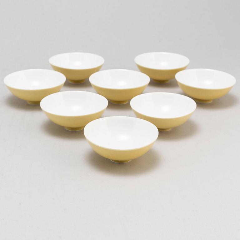 Eight Chinese yellow glazed bowls, late 20th century.