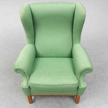 An 'Oxford' easy chair for Firma Svenskt Tenn.