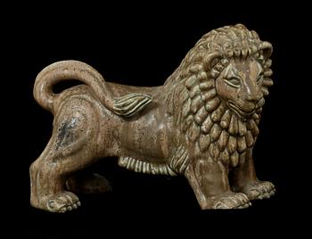 A Gunnar Nylund stoneware figure of a lion, Rörstrand.