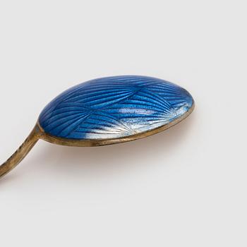 Tillander, a 10-piece set of enamelled and gilt silver coffee spoons, Helsinki.