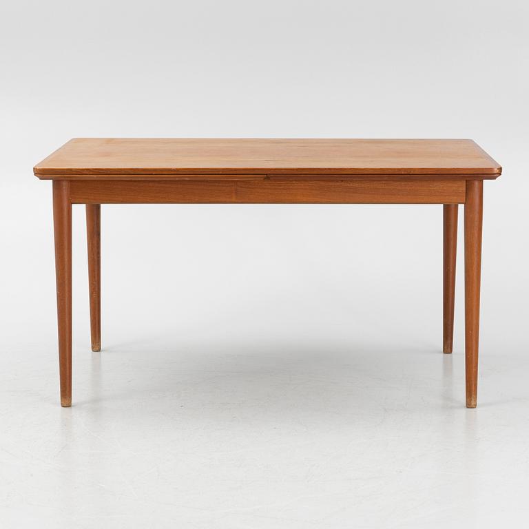 A teak-veneered dining table, 1960's/70's.