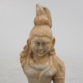 An Indian stone sculpture, 20th century.