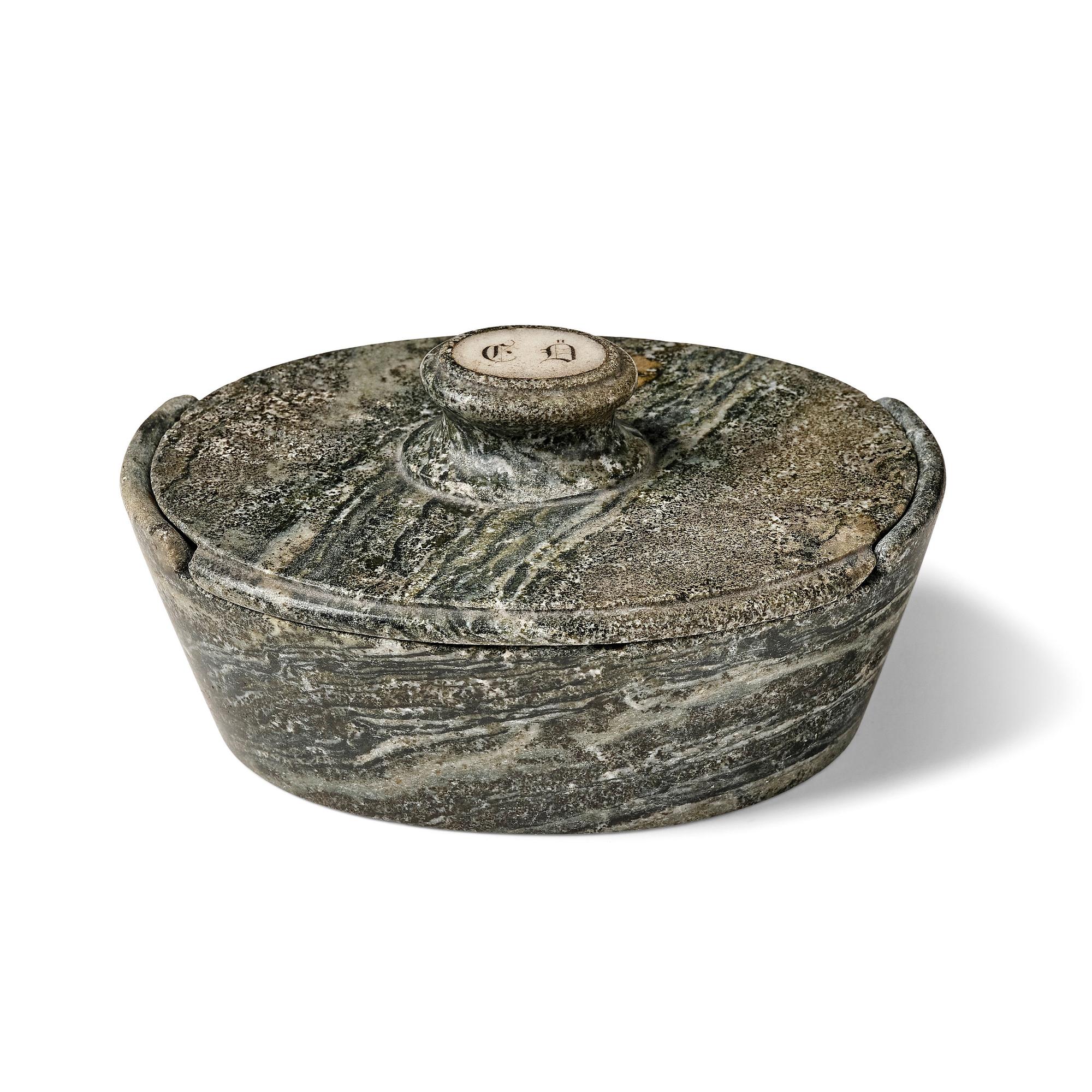 A Swedish Empire 'Kolmård' marble butter box with cover, early 19th century.
