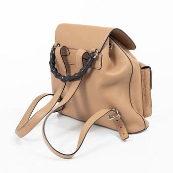 Gucci, a backpack.