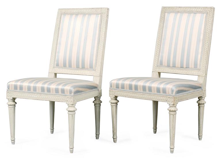 A pair of Gustavian chairs.