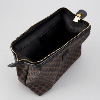 CÉLINE, a Macadam canvas bag and toilet bag.