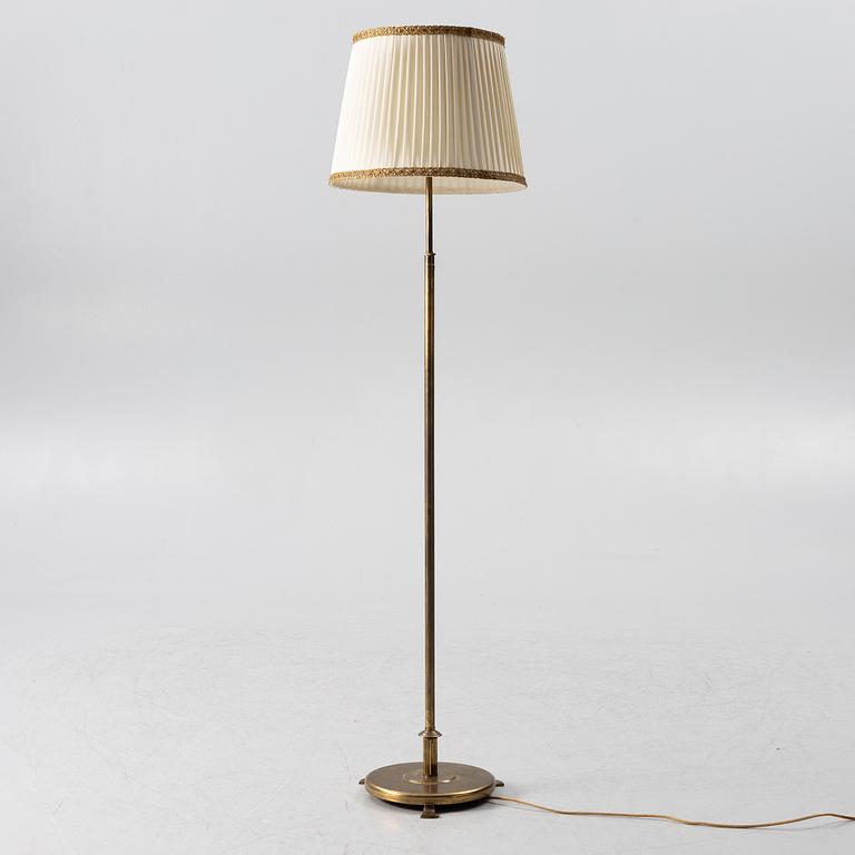 A brass floor lamp, 1940s.