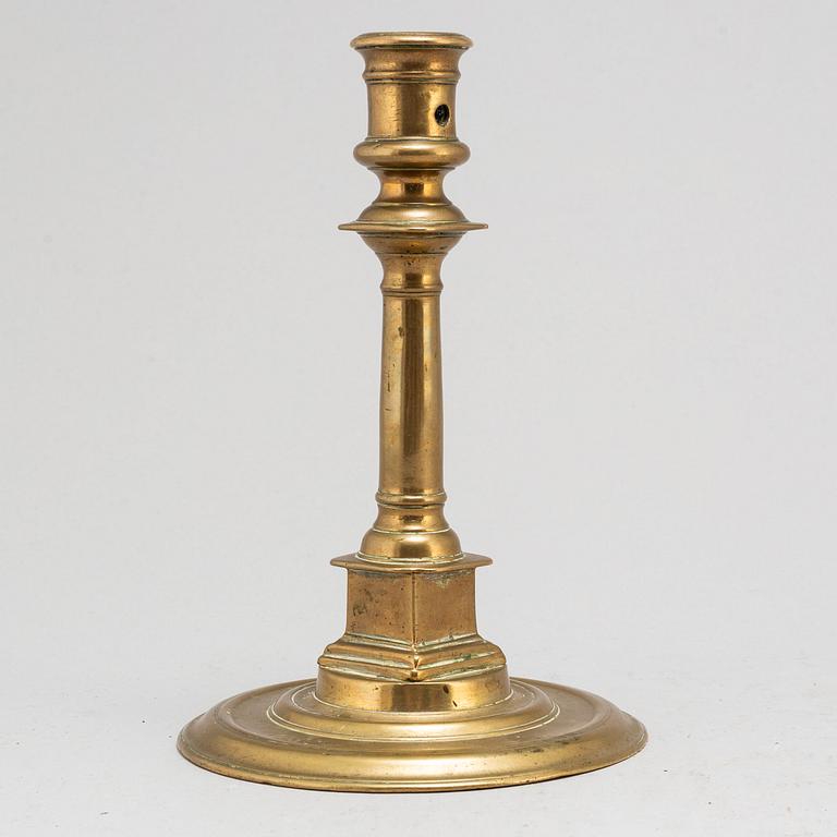 A French late 16th century bronze candlestick.