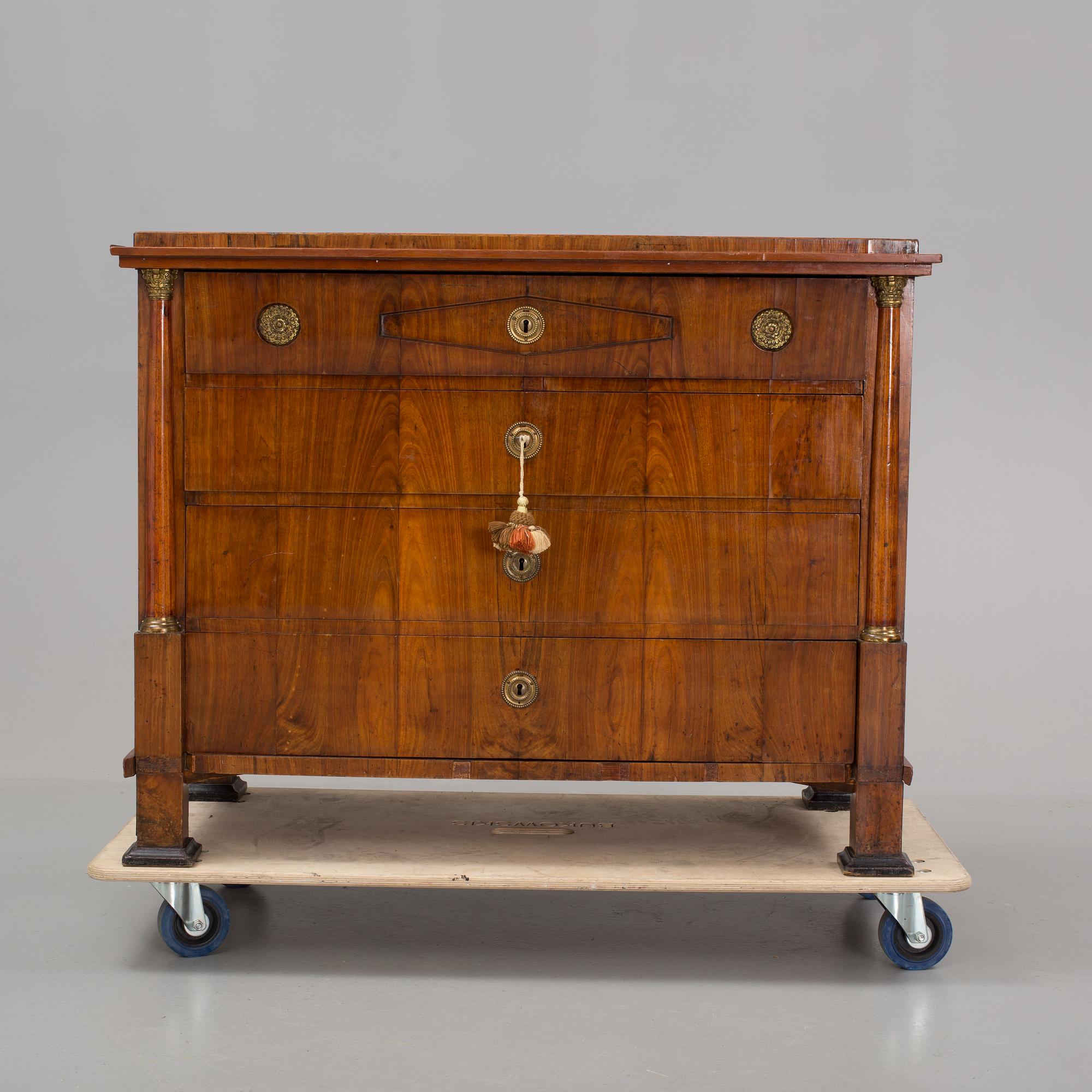 An early 19th century, Empire secretaire cabinet.