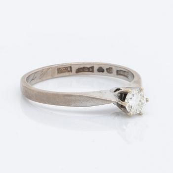 DIAMOND RING 18K whitegold 1 brilliant-cut diamond 0,25 ct inscribed.