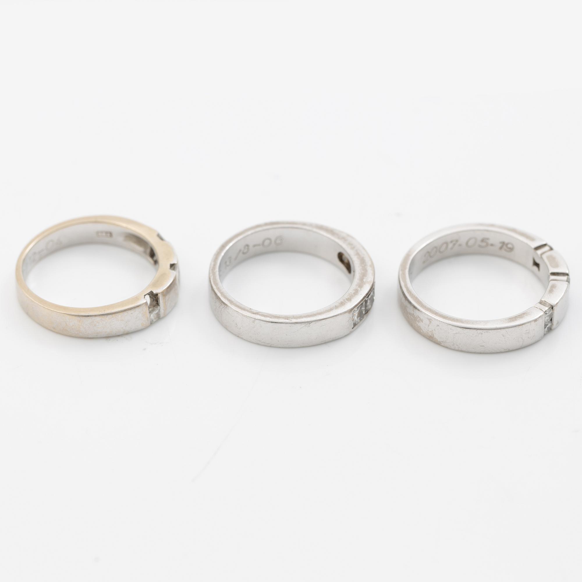 Three rings, 18K white gold with brilliant-cut and princess-cut diamonds.