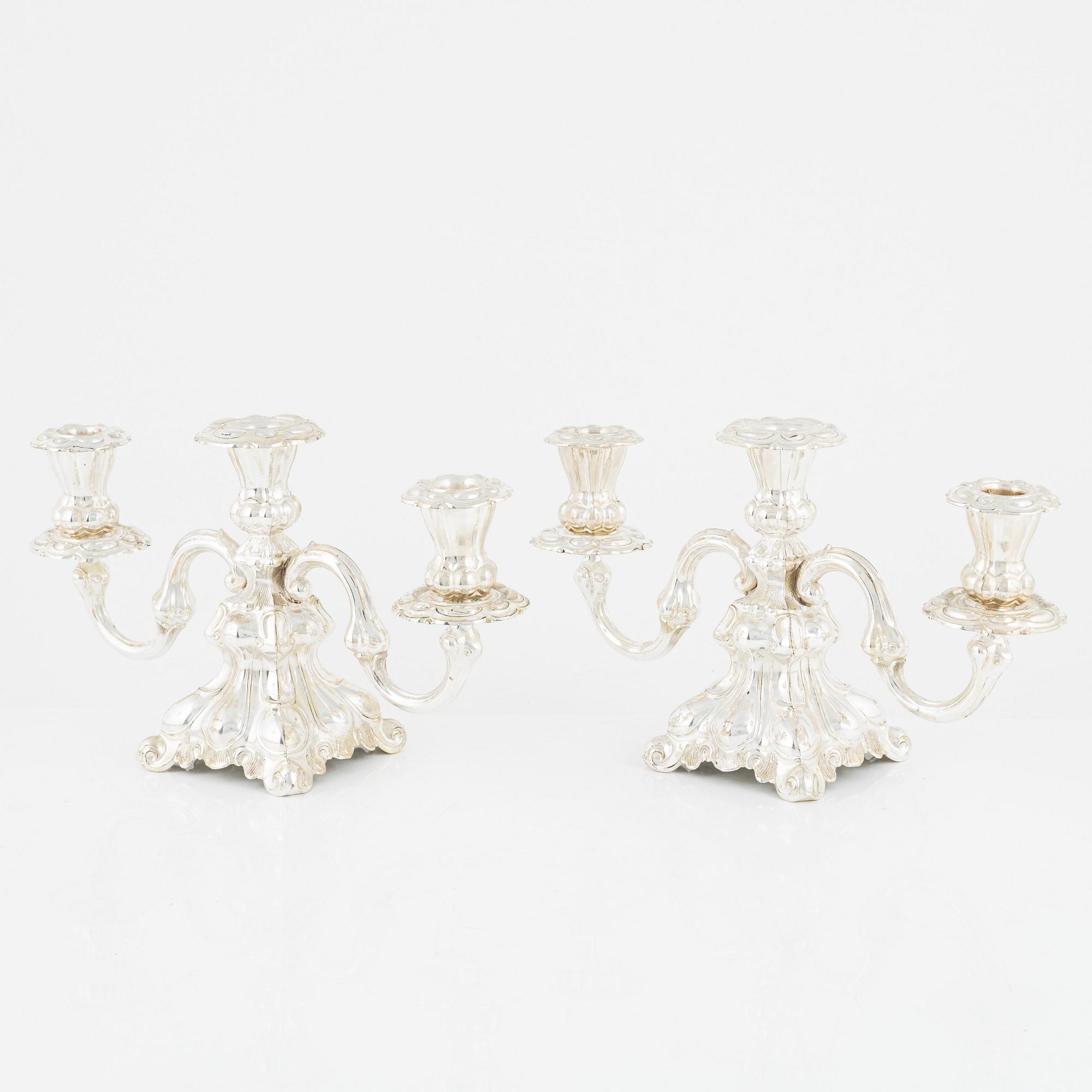 A pair of Baroque style candelabras, early 20th Century.
