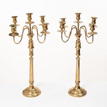 A pair of brass candelabra, model N12, Nyköpings Bruk, Sweden, around 1900.