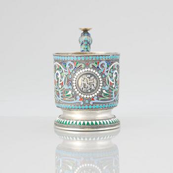 A Russian 19th Century silver-gilt and enamel tea-glass holder, unidentified makers mark, Moscow before 1899.