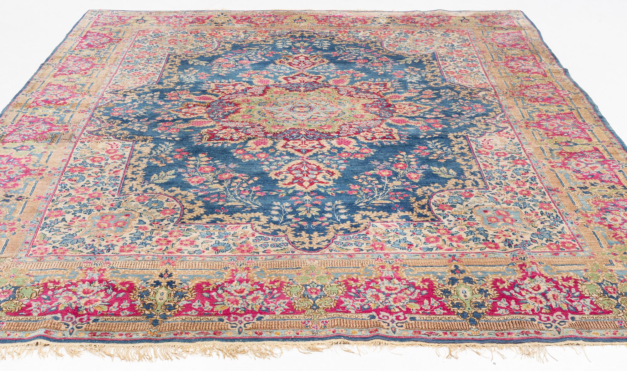 A carpet, Kerman, ca 358 x 275 cm.