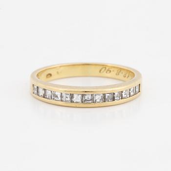 Step-cut diamond ring.