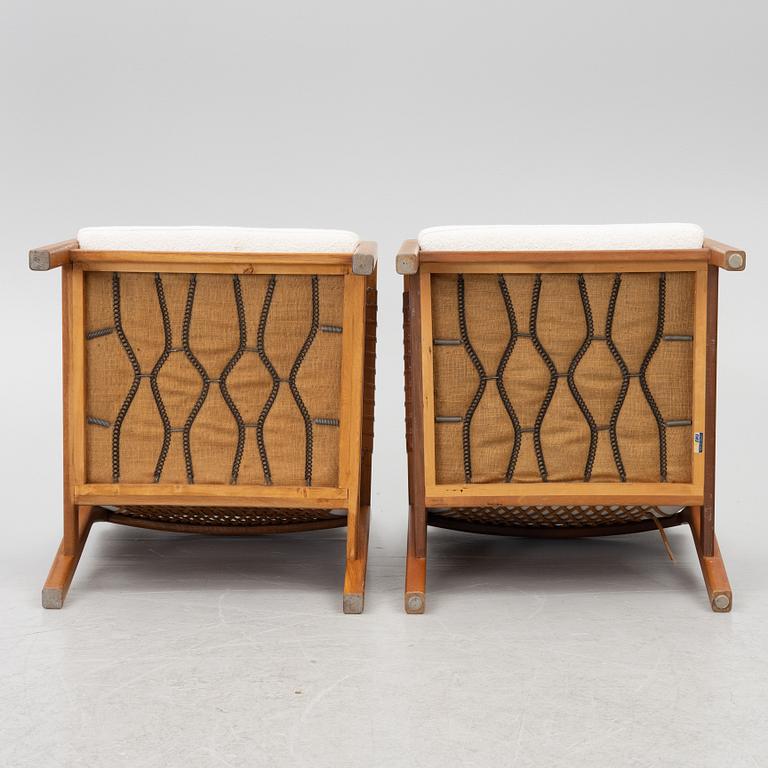 Carl Gustaf Hiort af Ornäs, a matched pair of 'Rialto' lounge chairs, Puunveisto Oy - Träsnideri Ab, Finland, mid-20th century.