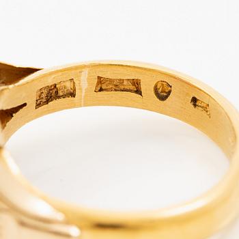 Ring 23K gold with synthetic stone.