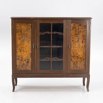 An oak and birch veneered vitrine cabinet, 1920s.
