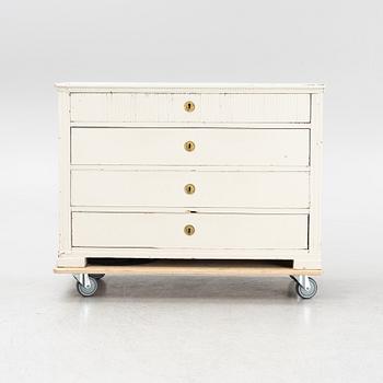A painted chest of drawers, 19th Century.