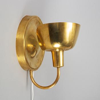 JOSEF FRANK, a brass wall light model 2389, Firma Svenskt Tenn.