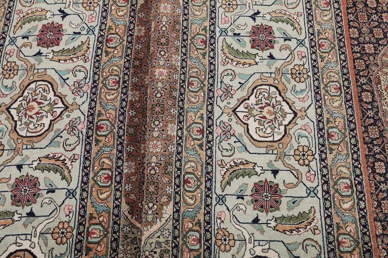 A carpet, Tabriz, part silk, 50 raj, ca 414 x 300 cm.