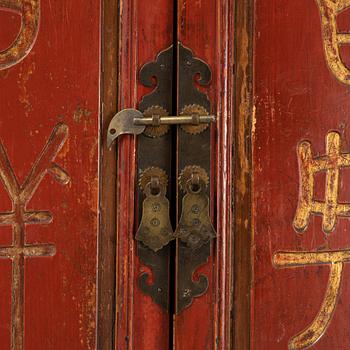A Chinese lacquered cabinet, 20th century.