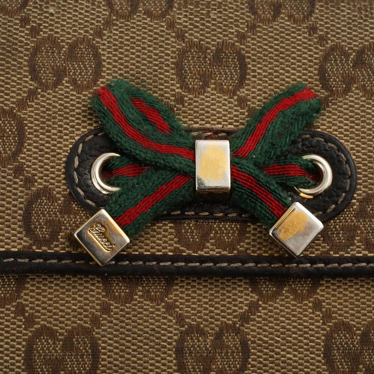 PLÅNBOK, Gucci.