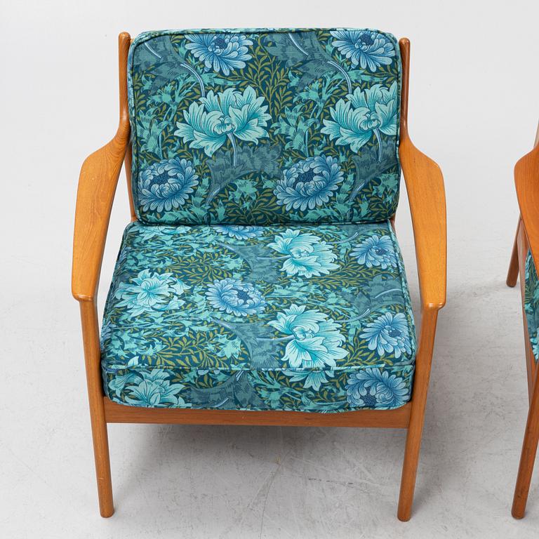 Folke Ohlsson, a pair of 'USA 75' armchairs, Dux, Sweden, 1960's.