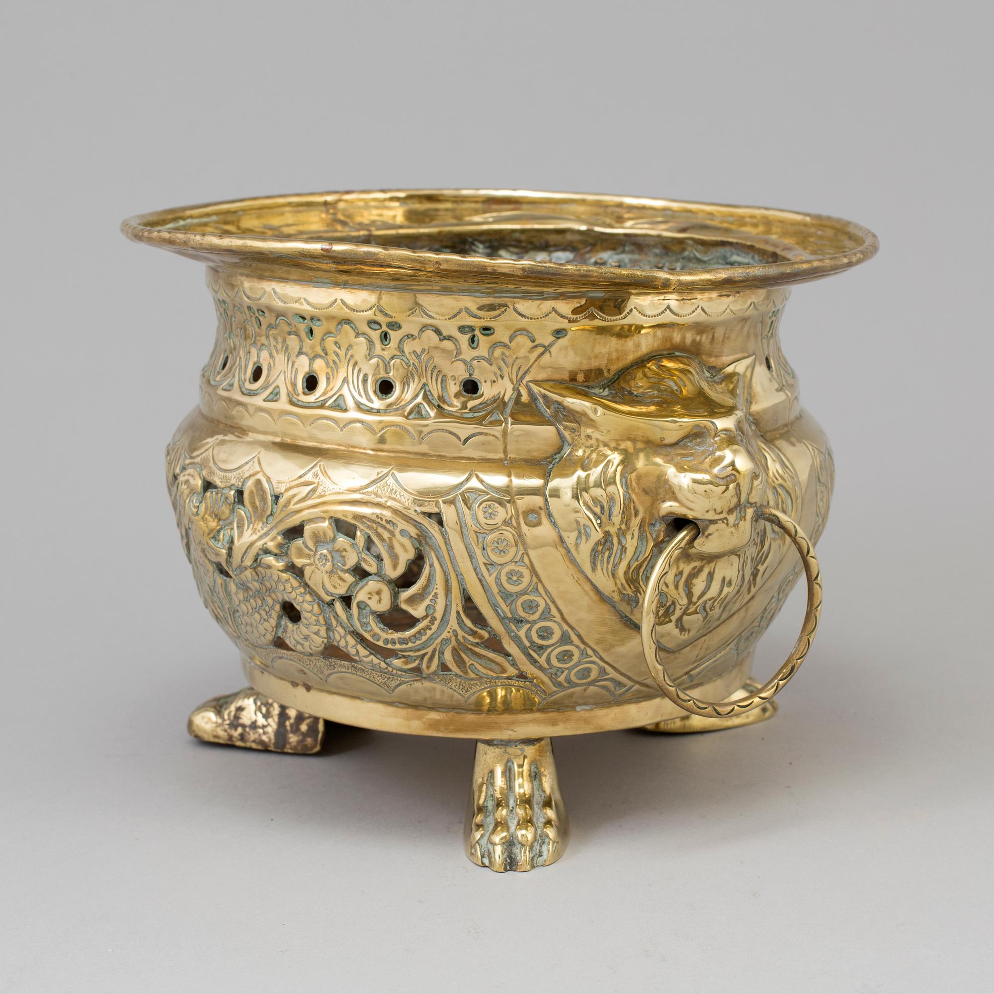 A 18th/19th century brass flower pot.