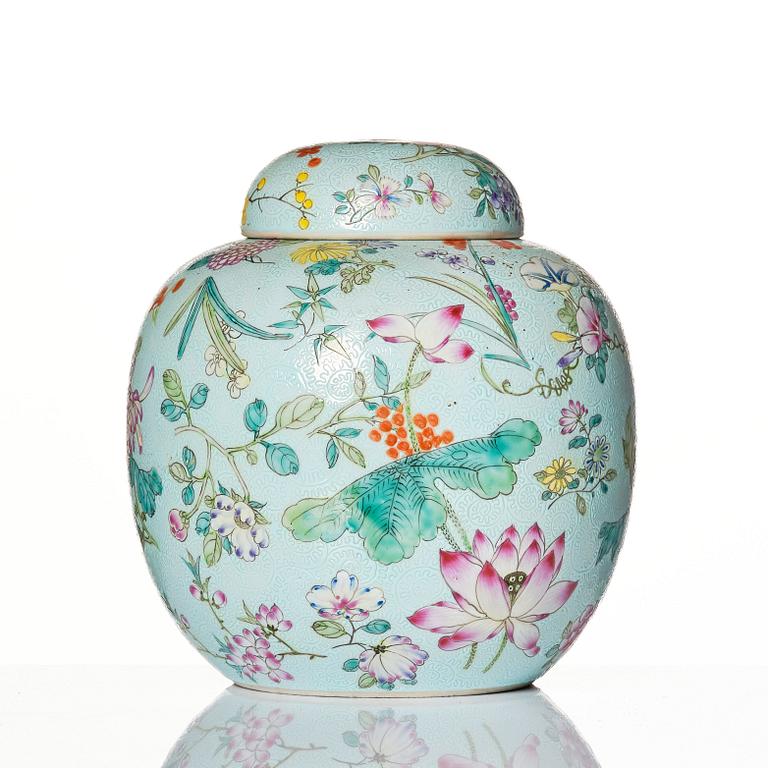 A Chinese mille fleur jar with cover, 20th Century, with Guangxu mark to base.