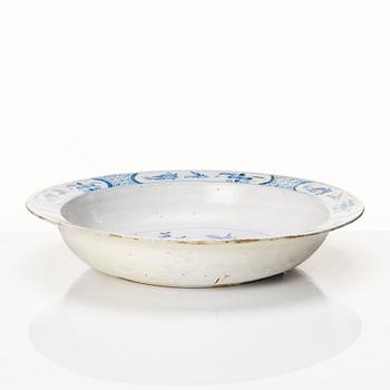 A large Swedish Rörstrand basin/deep dish, dated 28/5 1753.