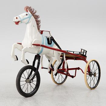 Toy horse with sulky, circa mid-1900s.