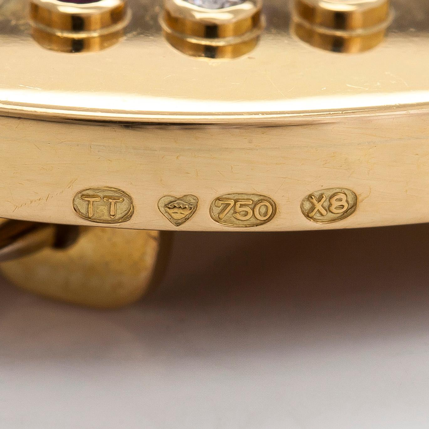 Torbjörn Tillander, an 18K gold brooch, with brilliant-cut diamonds, rubies and cultured pearls. Helsinki 1983.