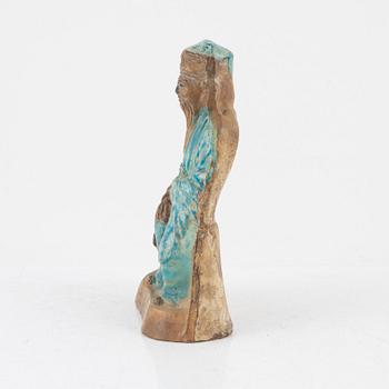A turquoise glazed pottery figure of a Daoist dignitary, Ming dynasty (1368-1644).