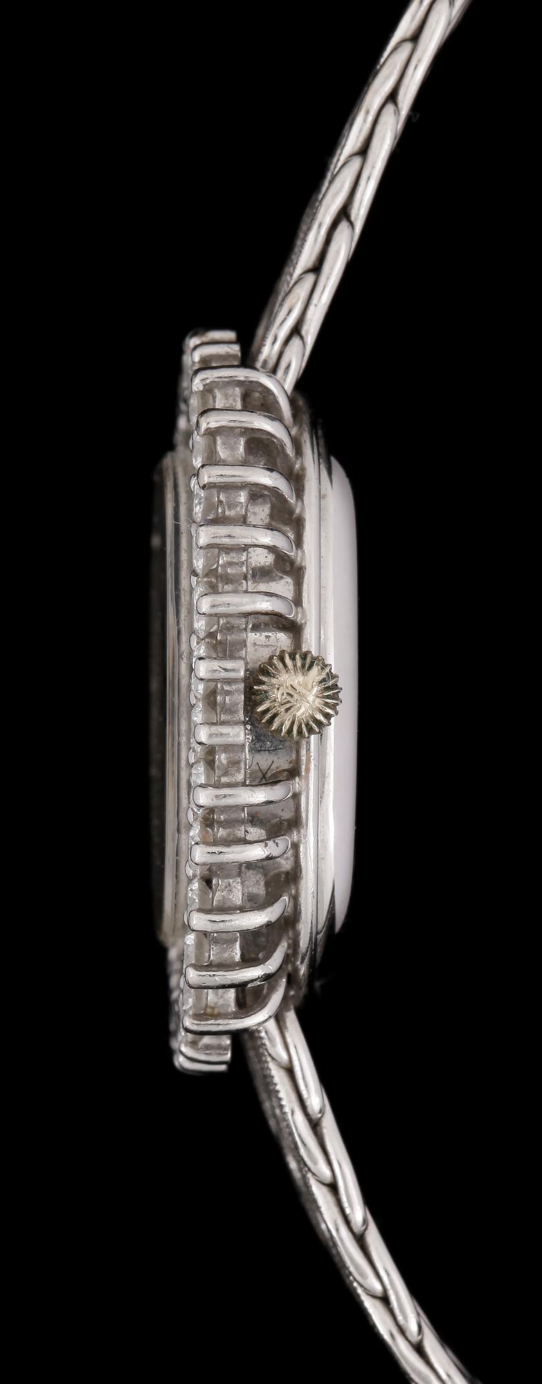 ARMBANDSUR, dam, Tissot, manuell, 18k vitguld, krans med briljantslipade diamanter tot ca0,68ct. Vikt 34g.