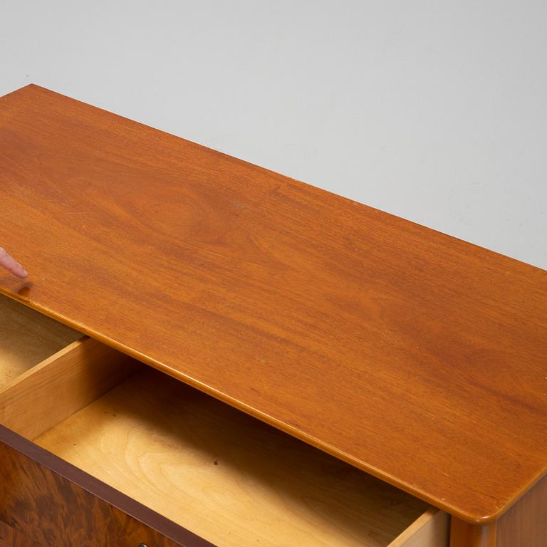 A Swedish Modern mahogany chest of drawers, 1940's/50's.