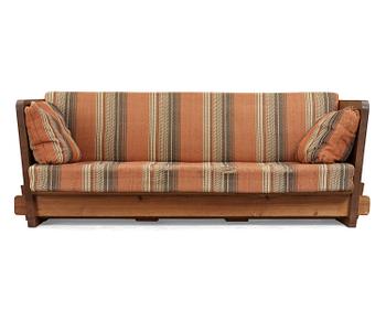 An Axel Einar Hjorth stained pine 'Lovö' sofa, Nordiska Kompaniet, Sweden ca 1930.