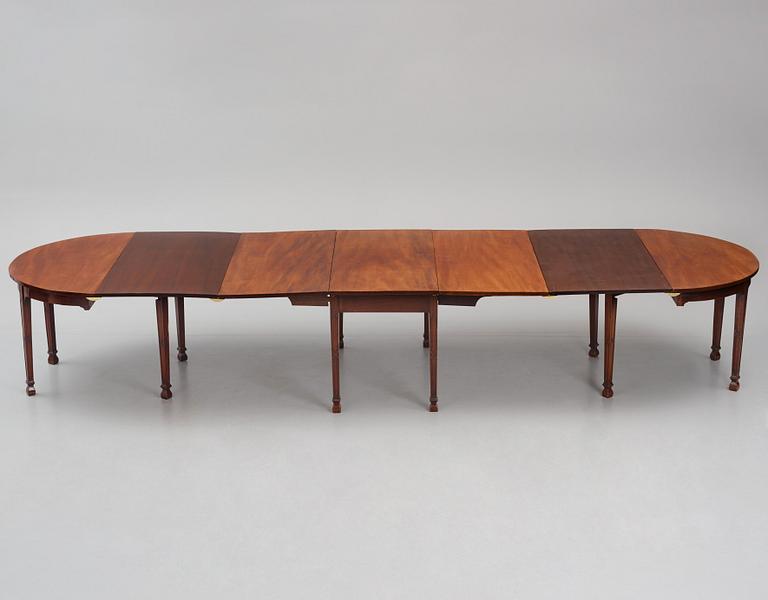 A George III mahogany D-end dining table, circa 1800.