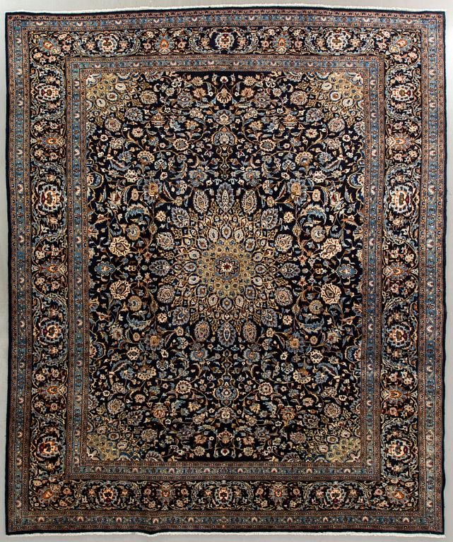 An old Kashan carpet c 375 x 295 cm.