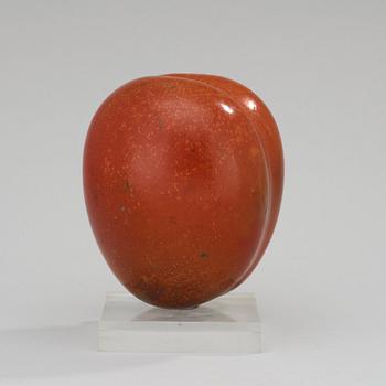 A Hans Hedberg faience sculpture of a plum, Biot, France.