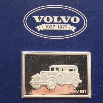 Twelve silver plaques with Volvo cars by Franklin Mint 1978.